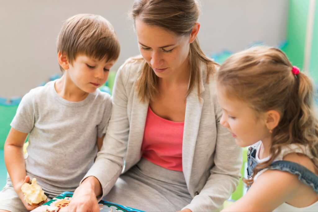 Teacher reading book for kids
